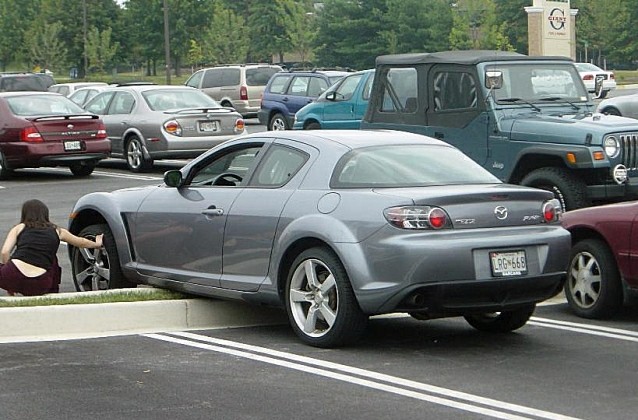 RX8 versus woman and curb...